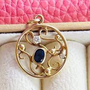 14K blue sapphire and diamond pendant